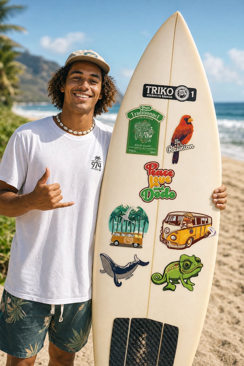 Stickers TRIKO collés sur une planche de surf à La Réunion : cardinal, baleine, caméléon, combi 974, rhum traditionnel